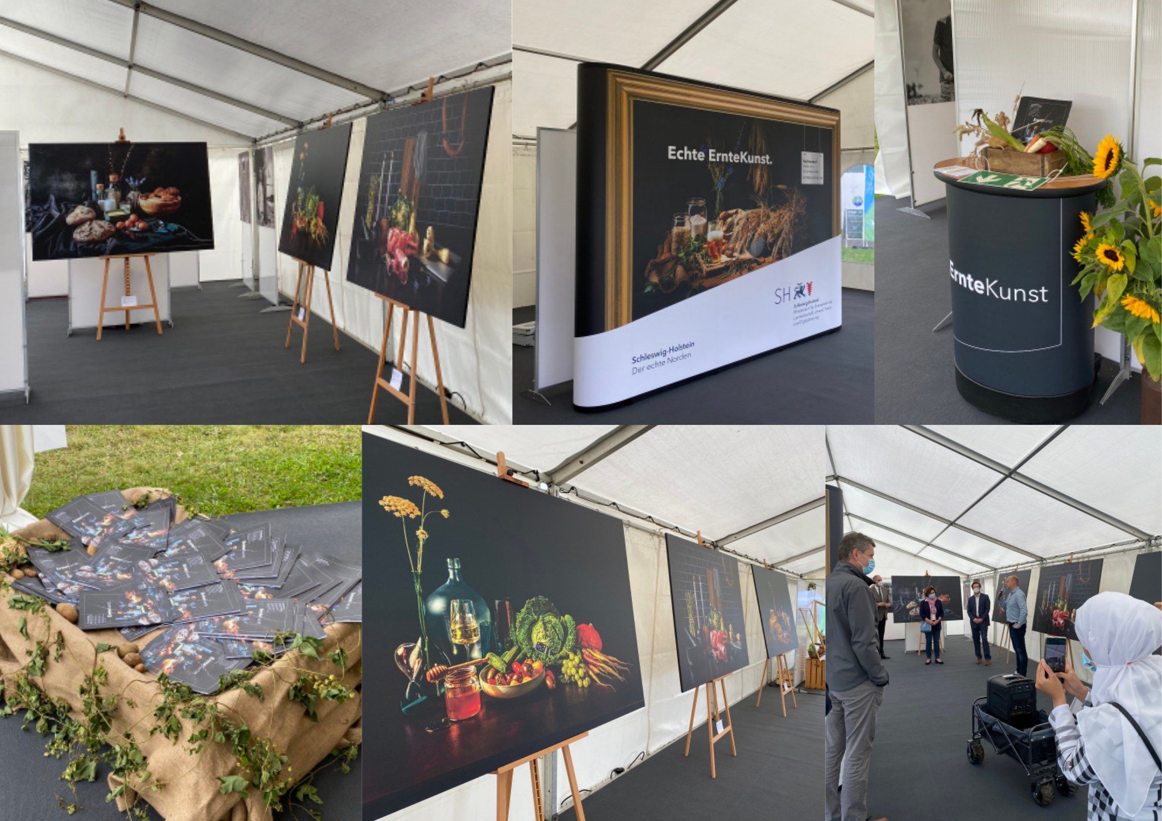 Die Wanderausstellung im Messezelt der NORLA mit Besucherinnen und Besuchern